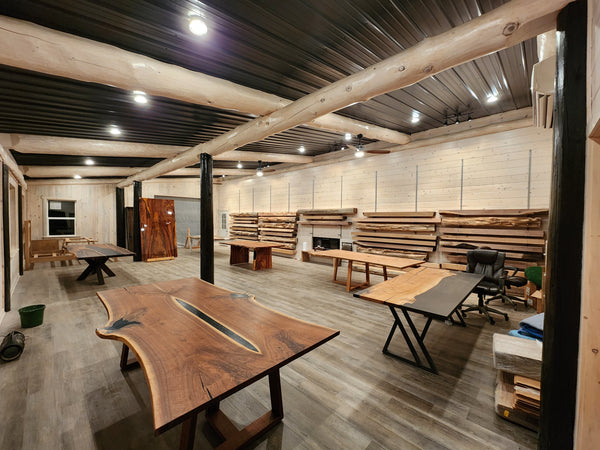 Furniture store featuring tables, bedroom sets, mantels and more