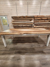 front view of english walnut wood dining table with bookmatched slabs and white epoxy