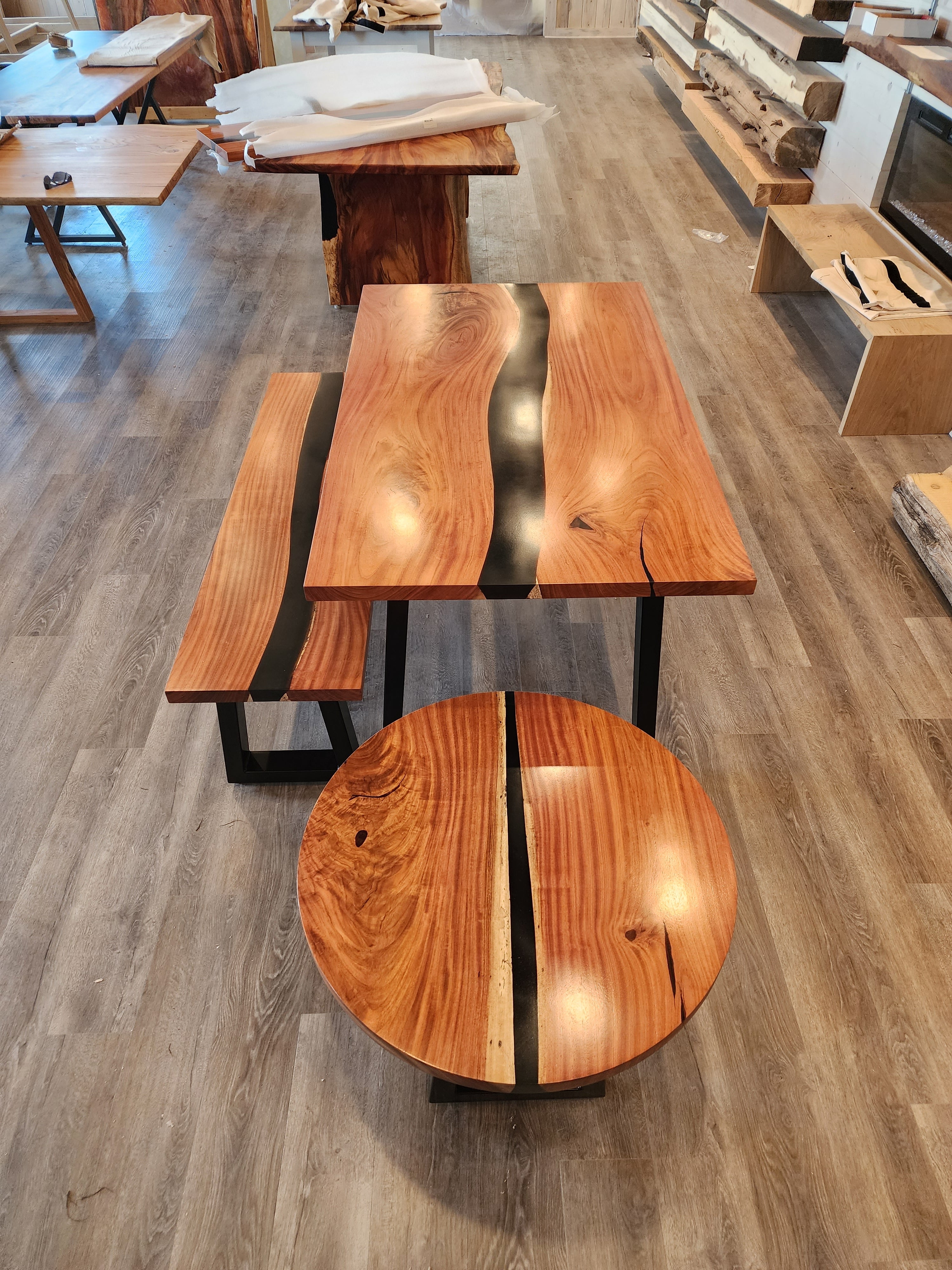 front view of jatoba wood epoxy river dining table set