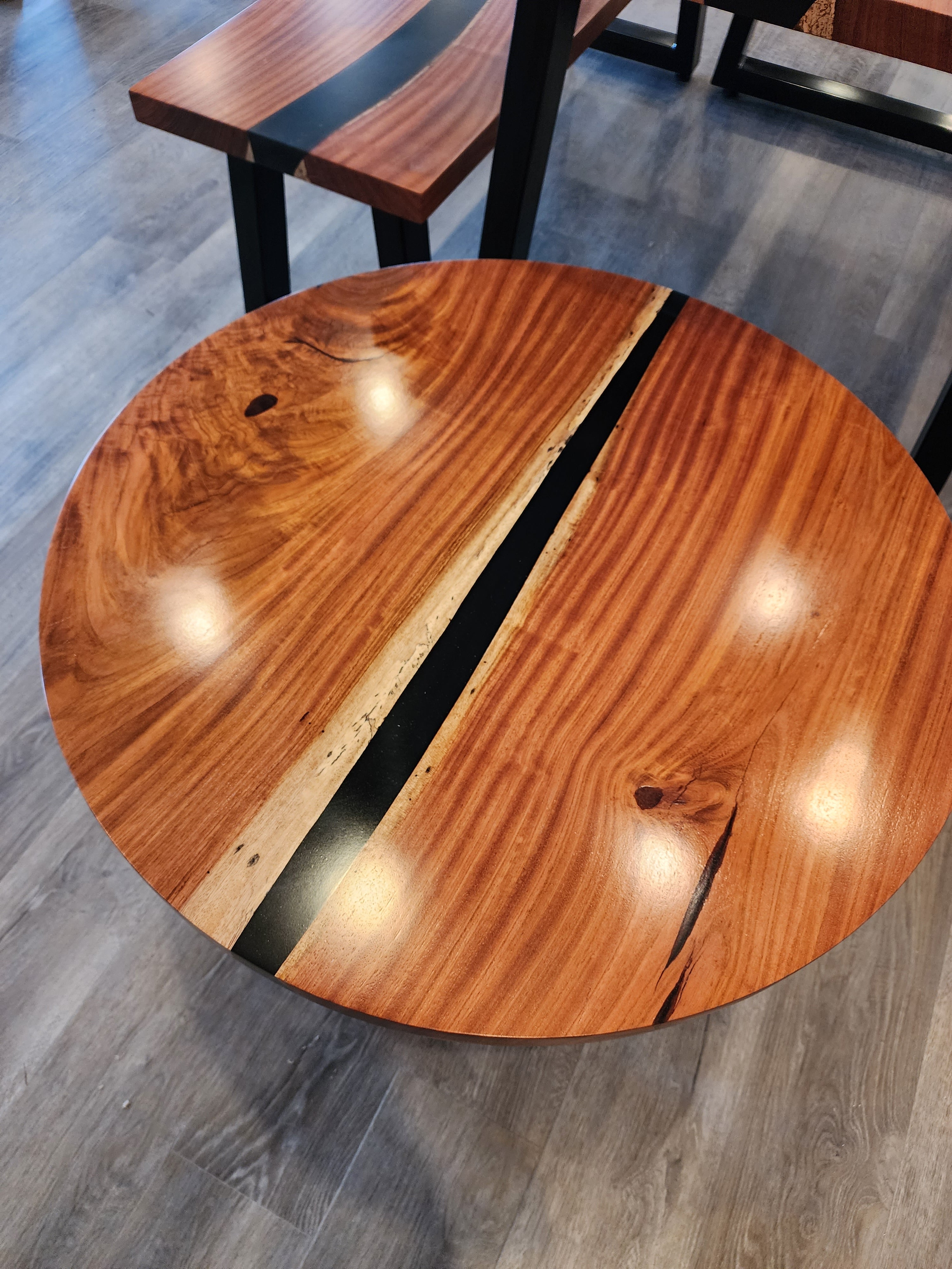 front view of jatoba wood epoxy river dining table set