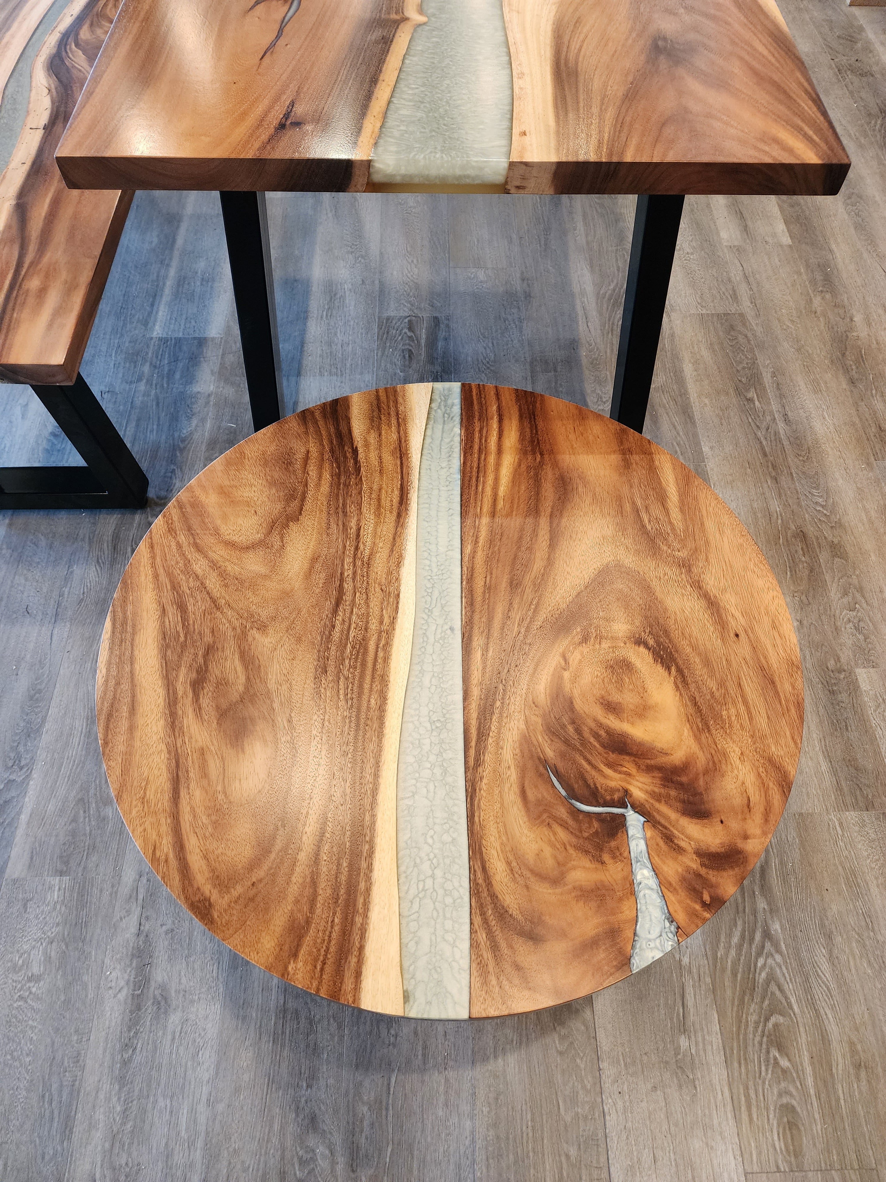 front view of monkey pod epoxy river dining table set