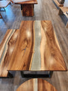 front view of monkey pod epoxy river dining table set