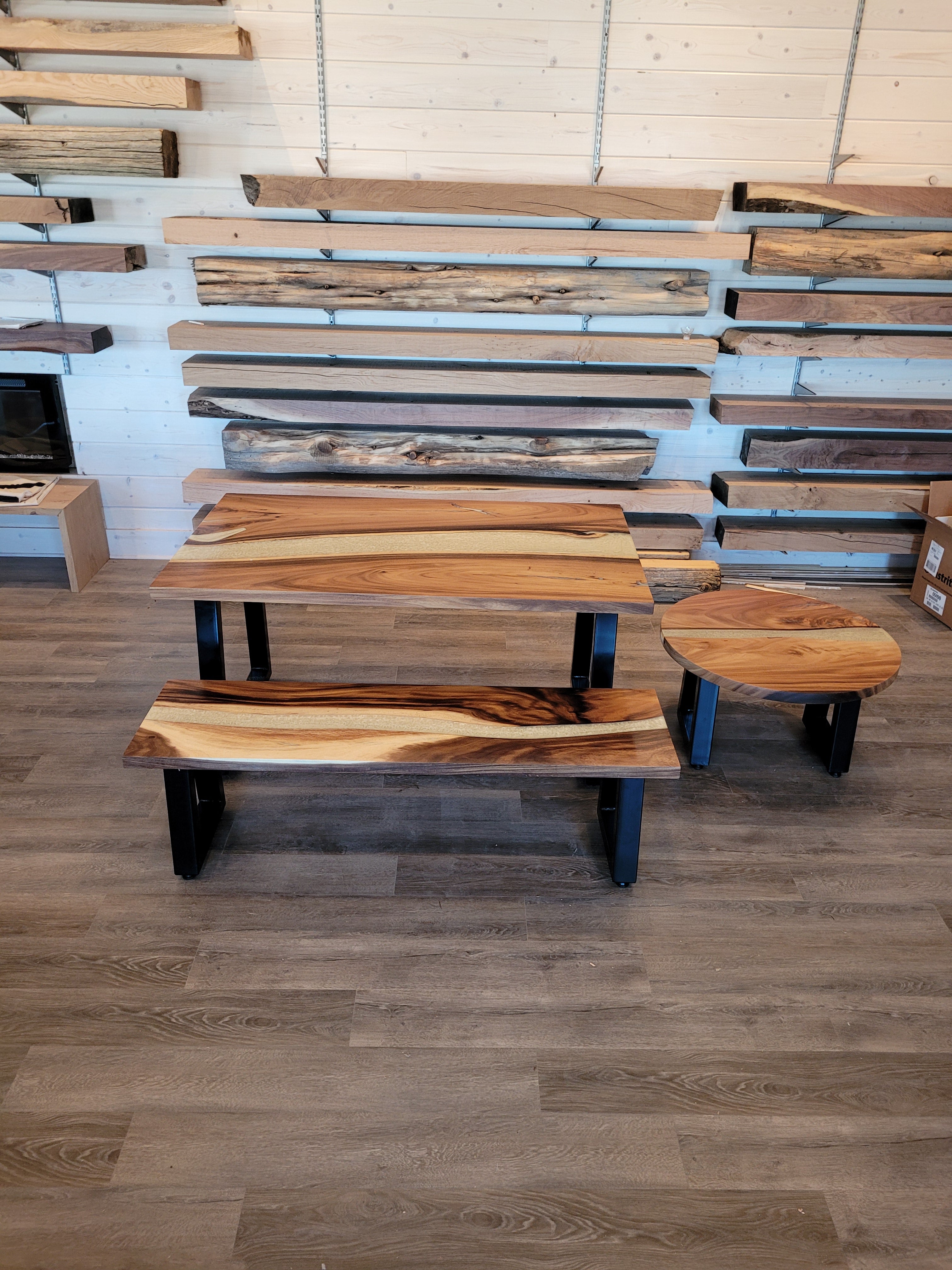 front view of monkey pod wood epoxy river dining table set