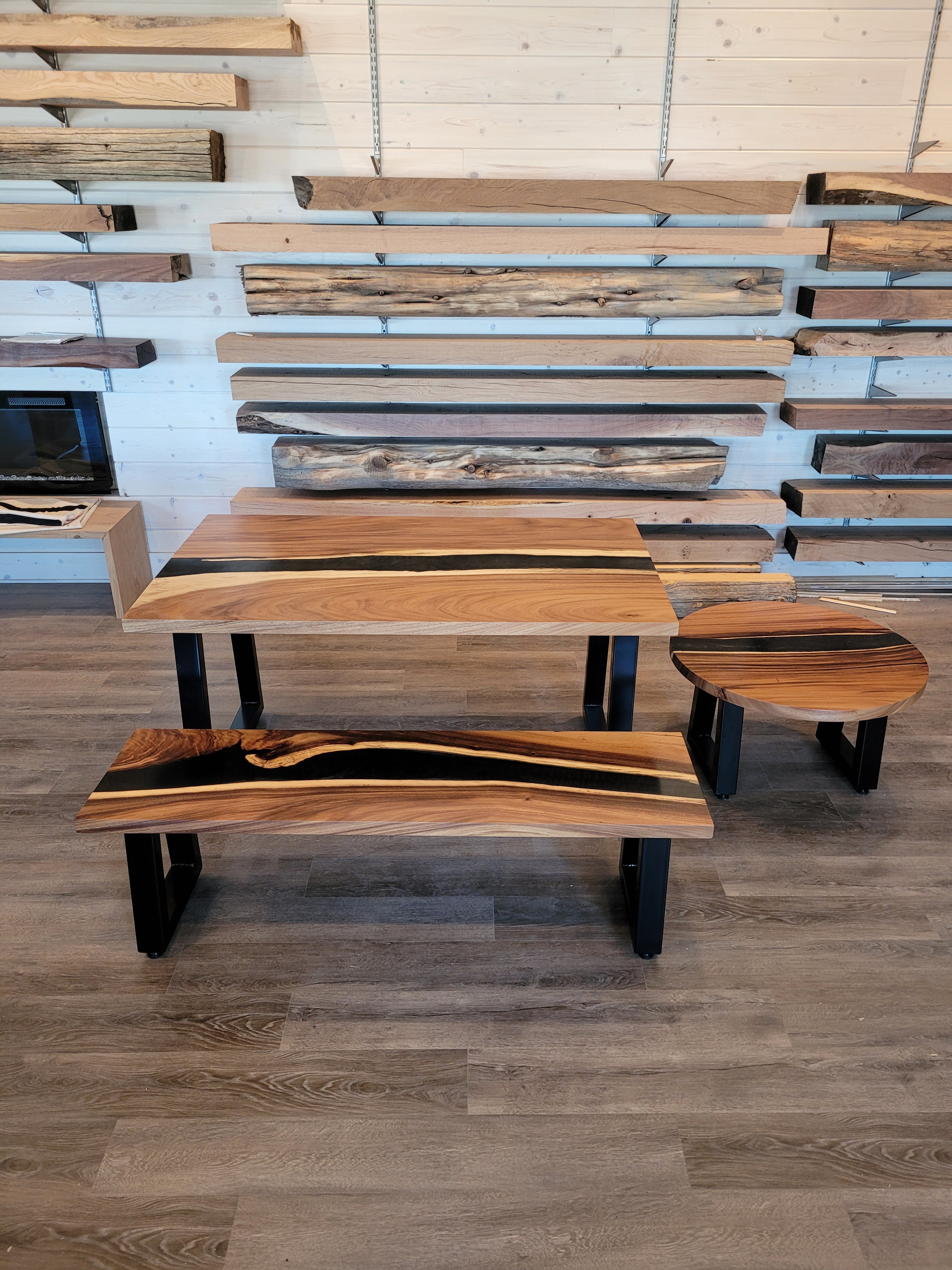 front view of monkey pod wood epoxy river dining table set