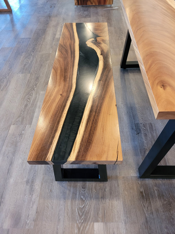front view of monkey pod wood epoxy river dining table set