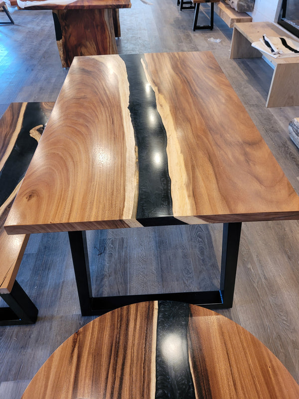 front view of monkey pod wood epoxy river dining table set