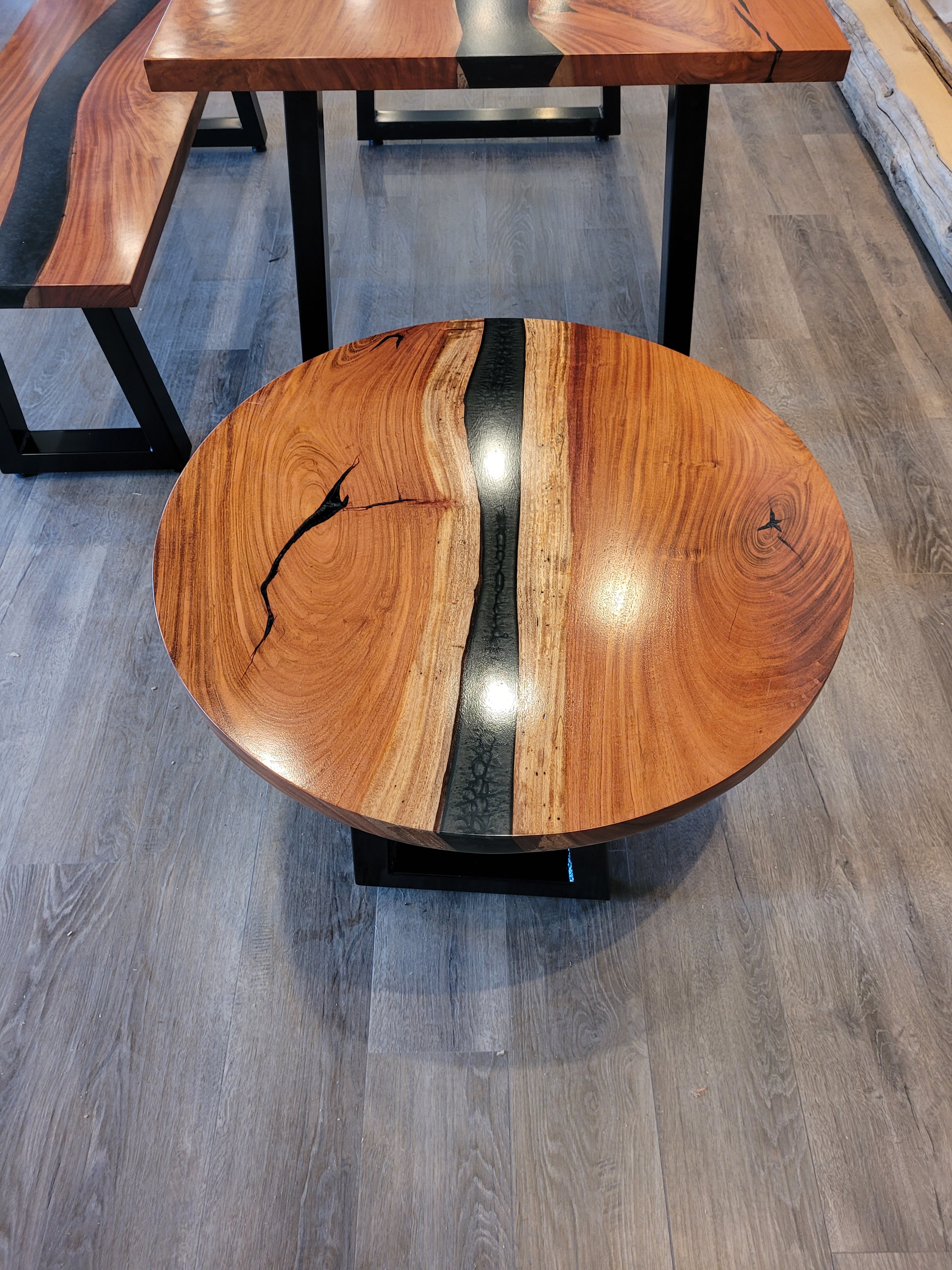 front view of monkey pod wood epoxy river dining table set
