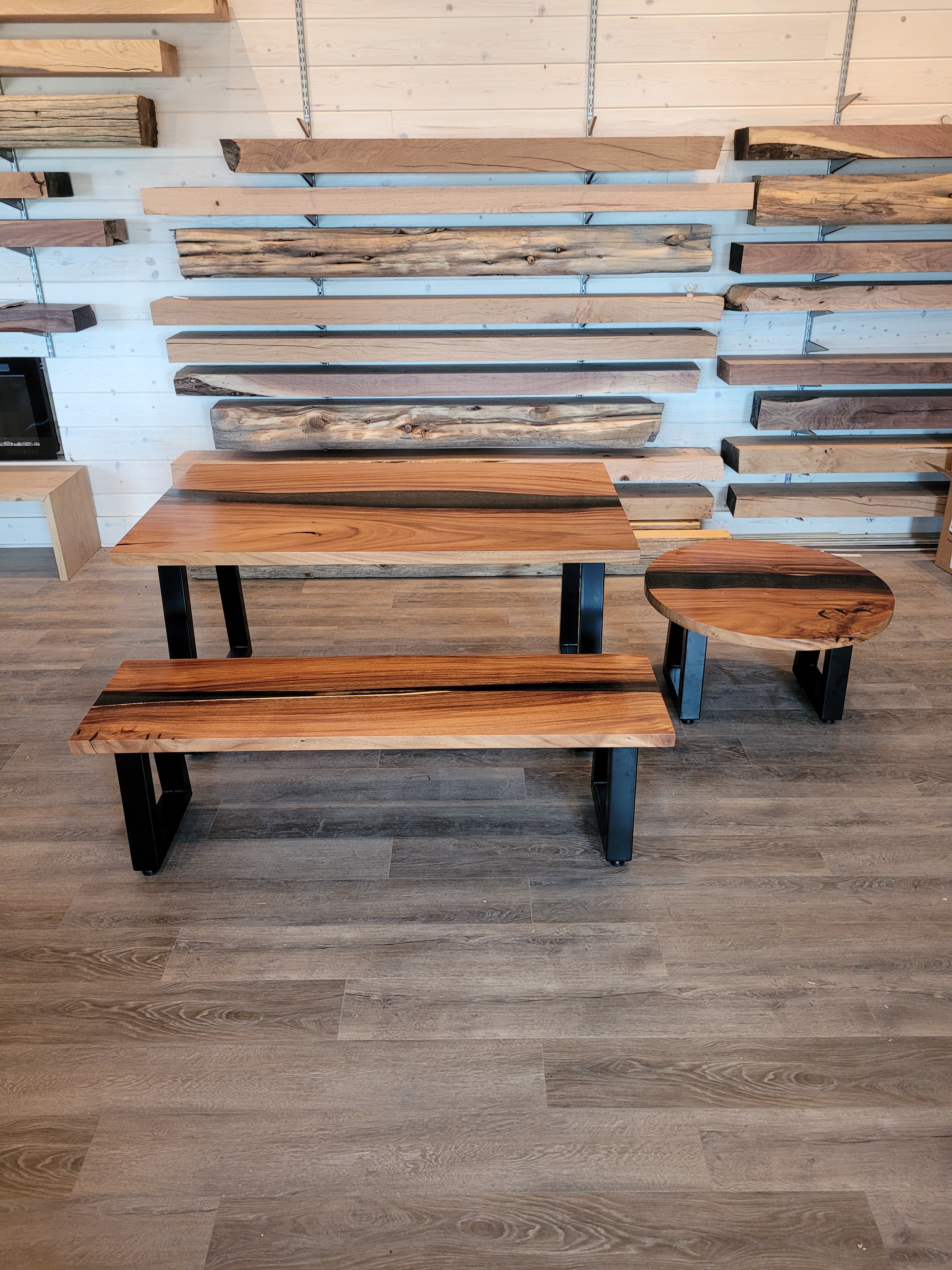 front view of monkey pod wood epoxy river dining table set