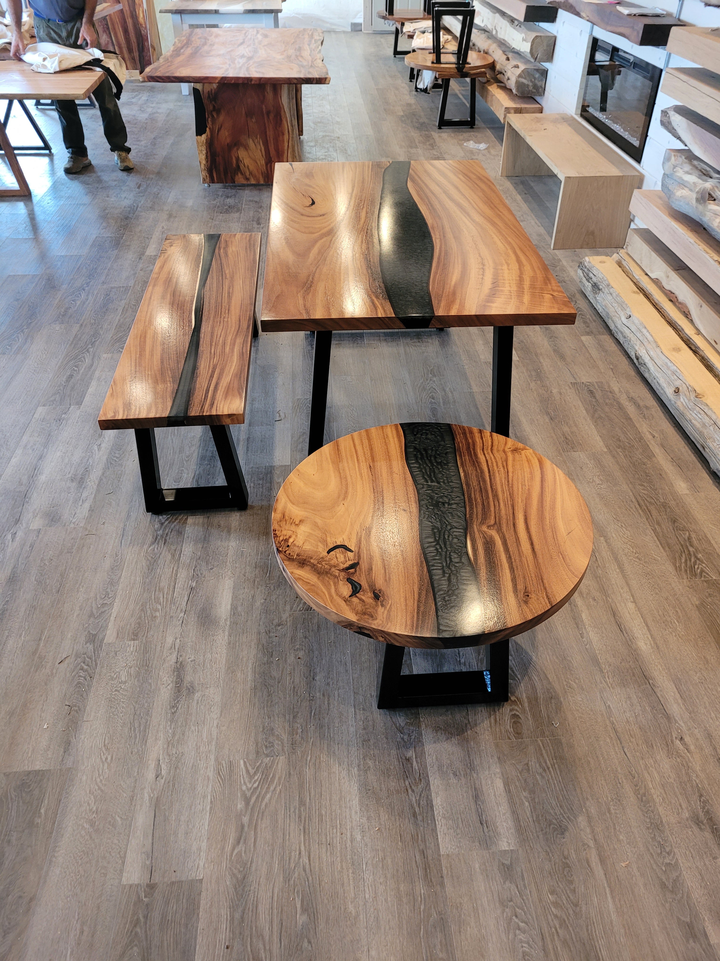 front view of monkey pod wood epoxy river dining table set