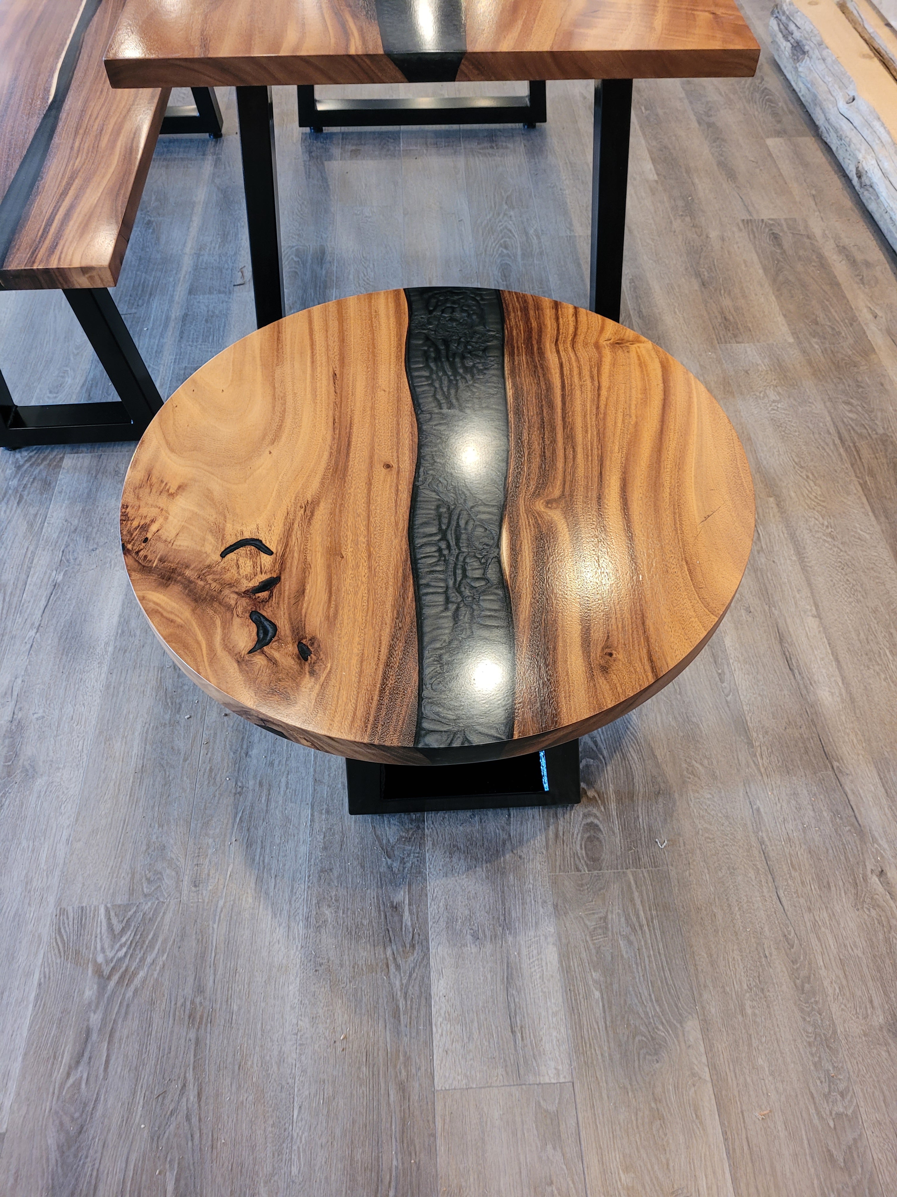 front view of monkey pod wood epoxy river dining table set