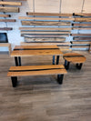 front view of monkey pod wood epoxy river dining table set