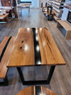 front view of monkey pod wood epoxy river dining table set