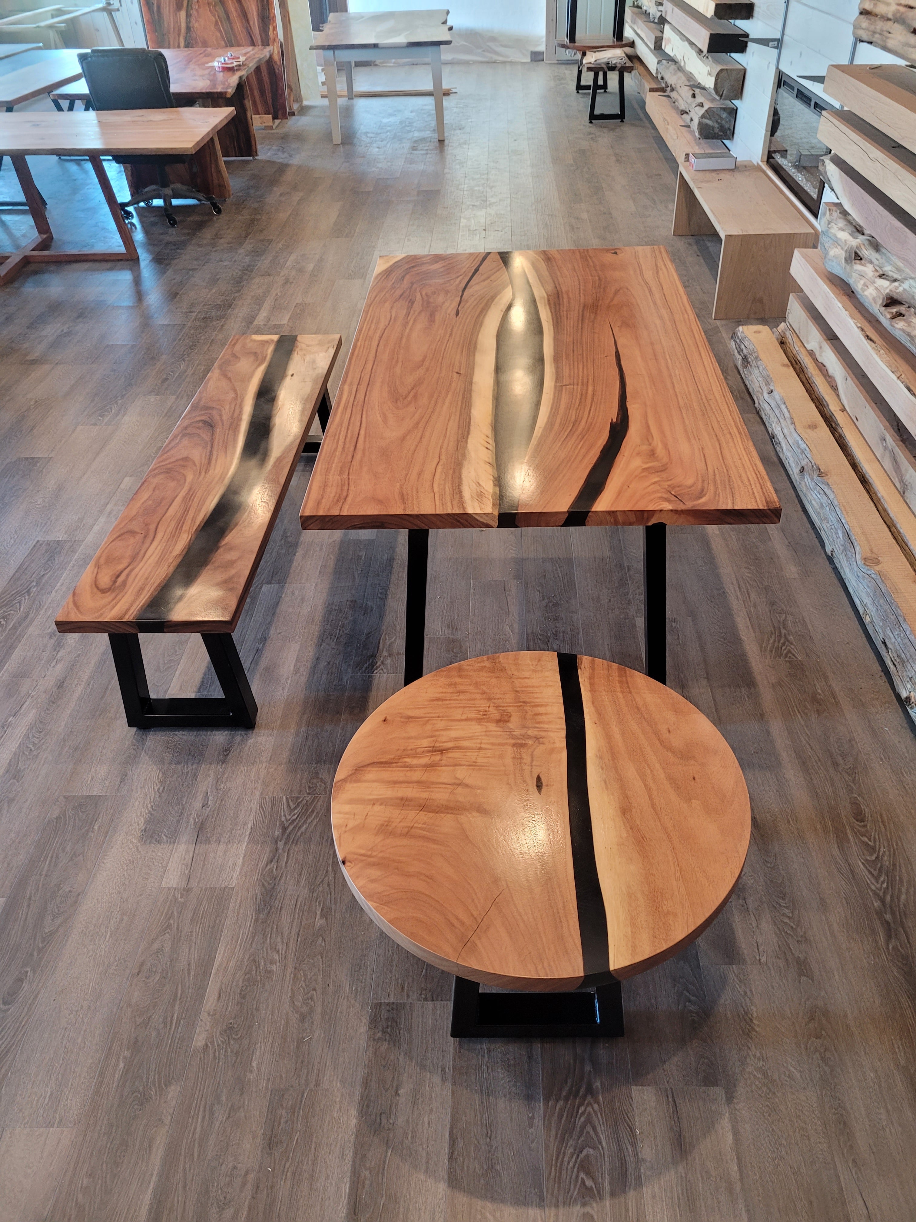 front view of monkey pod wood epoxy river dining table set
