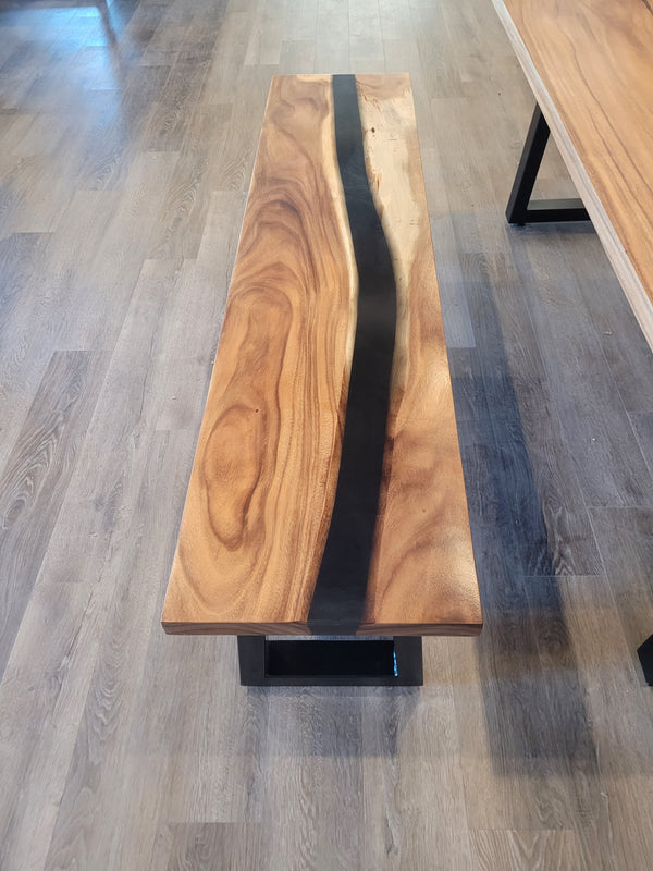 front view of monkey pod wood epoxy river dining table set