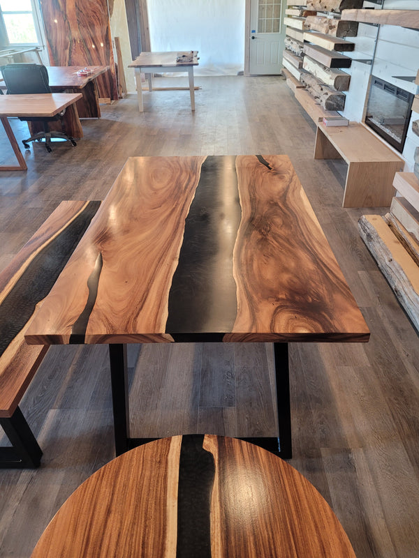 front view of monkey pod wood epoxy river dining table set