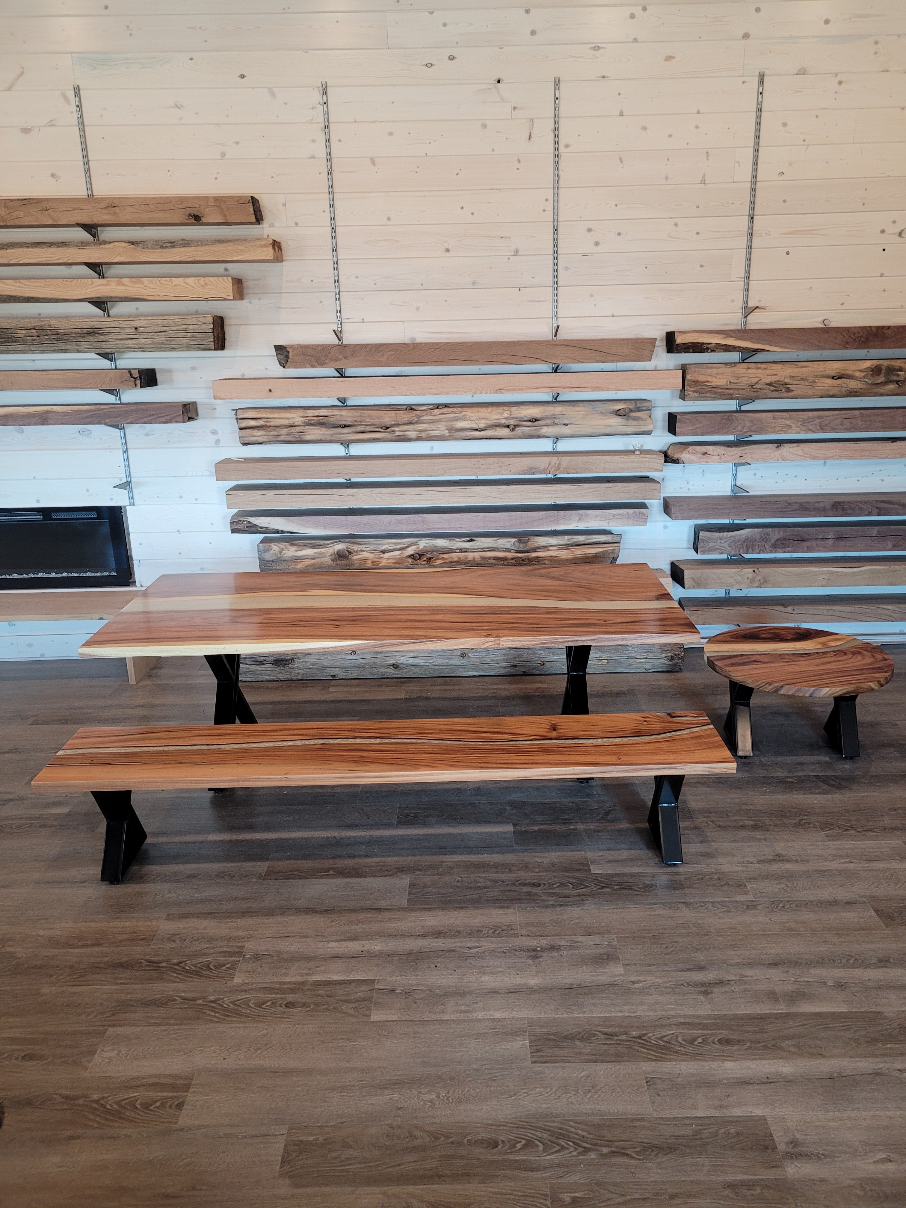 front view of monkey pod wood epoxy river dining table set