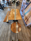 front view of a monkey pod epoxy river table set.