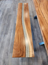 front view of a monkey pod epoxy river bench set.
