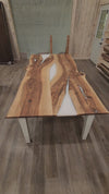 video of english walnut wood dining table with bookmatched slabs and white epoxy