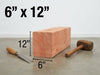 A 6 inch by 12 inch by 12 inch wooden block shown on a concrete floor with a chisel and mallet, featuring dimension lines and text overlays indicating measurements.